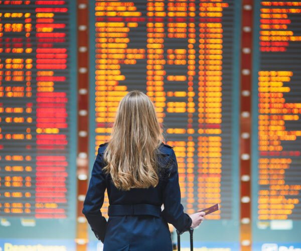 More passengers head for the airport this summer despite concerns over delays and congestion